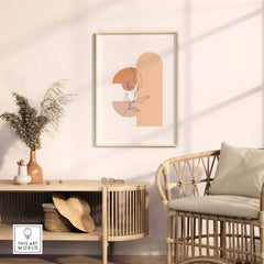 Mid Century abstract print featuring a floral design, framed art on a wall, stylish decor in a modern living room.
