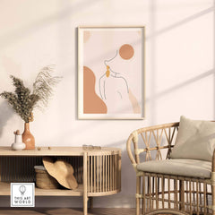 Abstract female outline print displayed in a stylish home setting, enhancing modern decor with contemporary art.