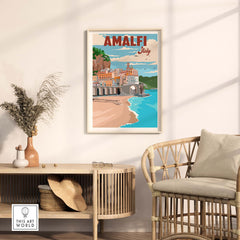 Amalfi Coast Italy vintage poster art print displayed in a stylish living room with natural decor.