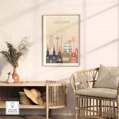 Cologne skyline print wall art displayed in a cozy living room setting with pastel tones and modern decor.