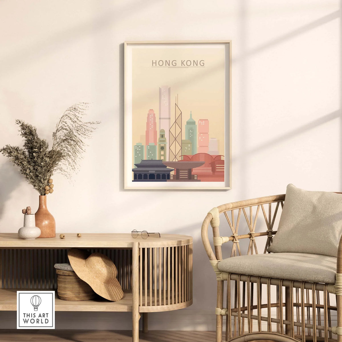 Hong Kong skyline wall art print in warm pastel tones displayed in a modern interior with a rattan chair.