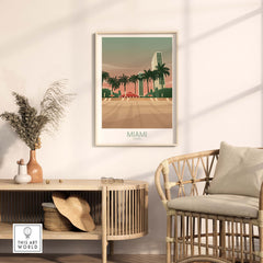 Stylish Miami Wall Art Poster Print framed on wall, showcasing vintage travel design with palm trees and a beach scene.
