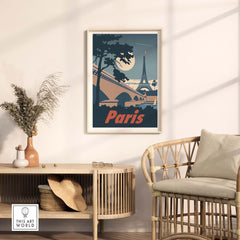 Vintage Paris poster wall art print featuring the Eiffel Tower and moonlit scenery in a stylish living room setting.