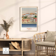 Porto Wall Art Portugal Print displayed in a stylish interior, featuring colorful vintage-style buildings by the water.