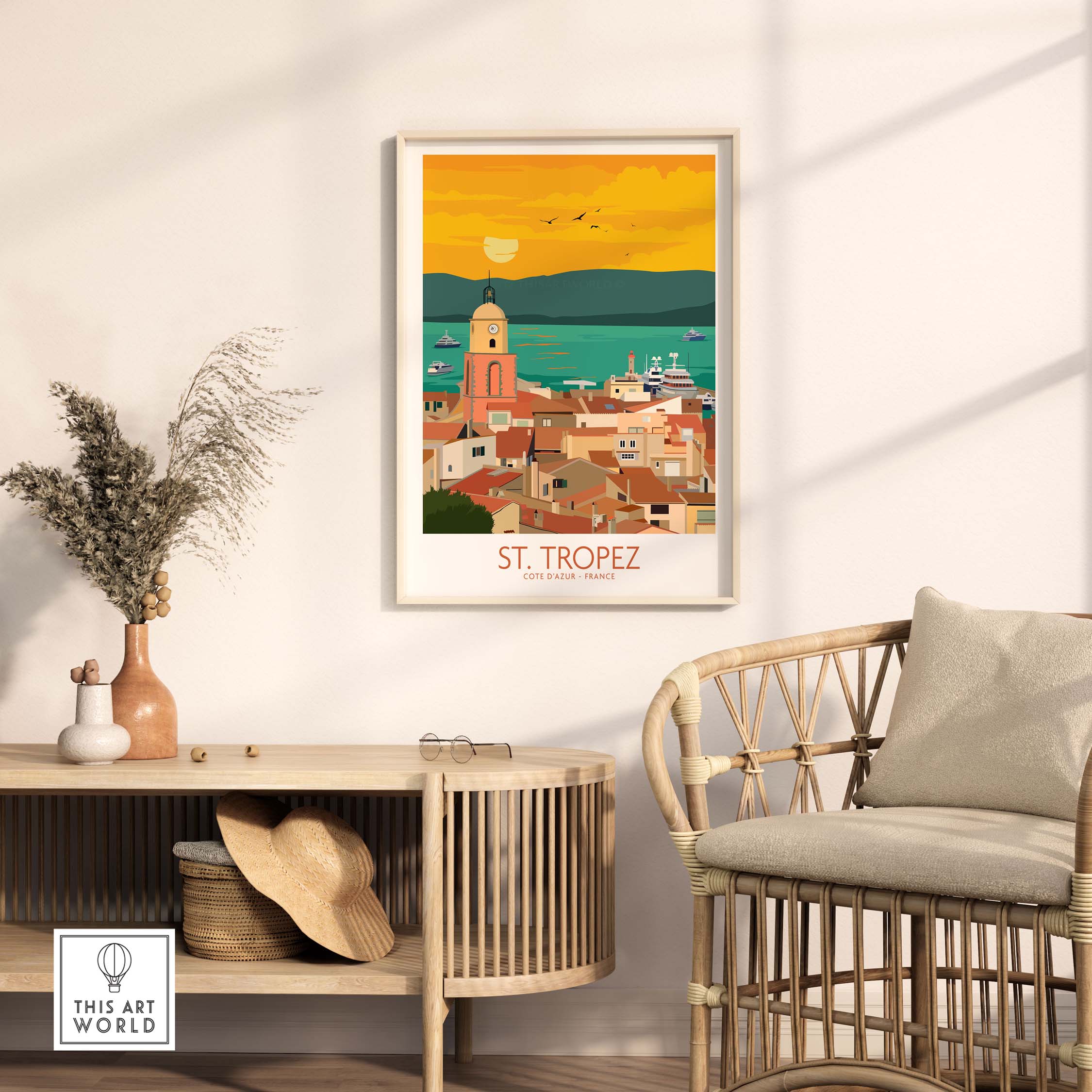 St Tropez Poster Print in a stylish home setting with a rattan chair and decor elements.