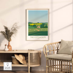 The Cotswolds vintage travel poster displayed in a stylish living room setting with natural decor.