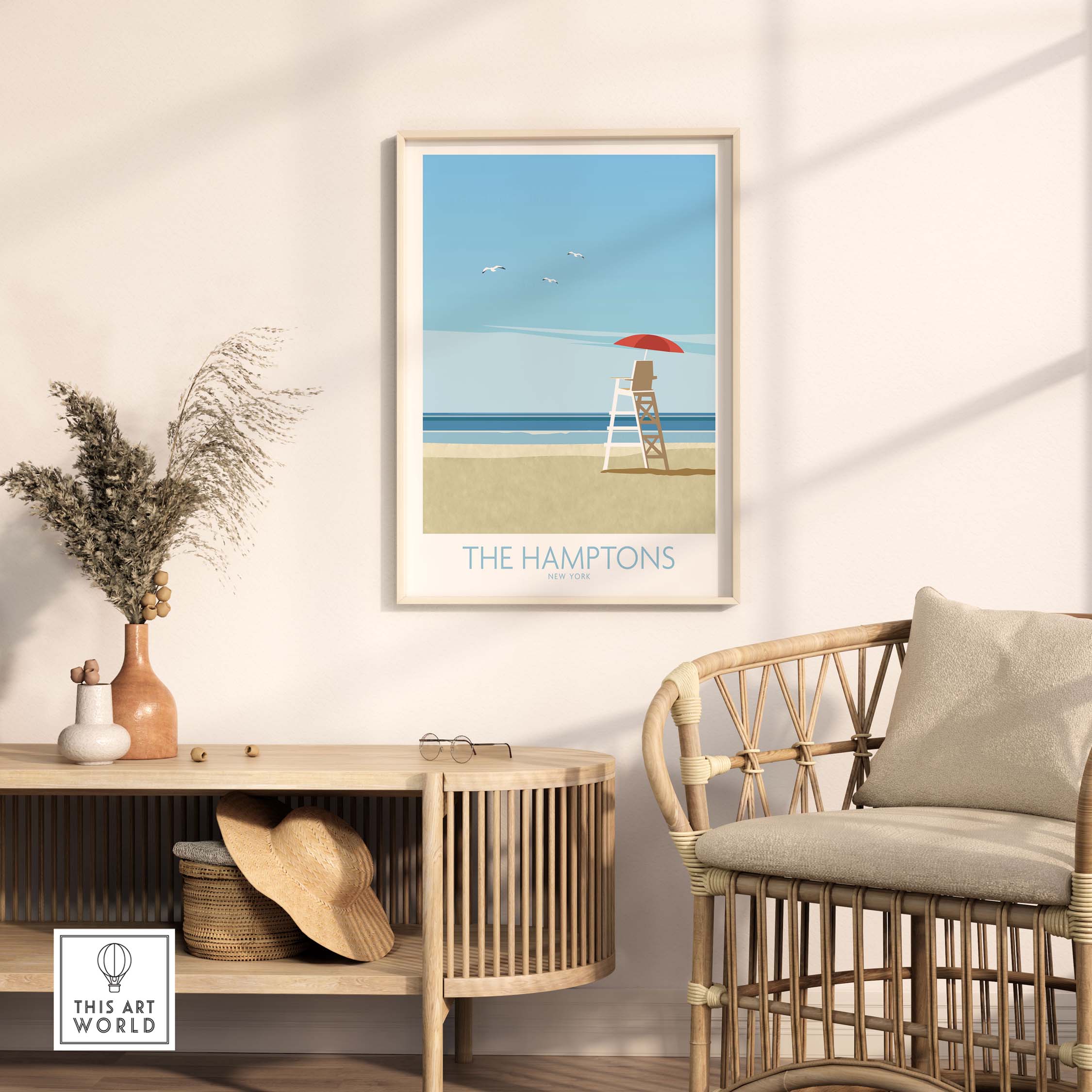 The Hamptons wall art framed in a minimalist interior setting, featuring a vintage beach scene with a lifeguard chair.