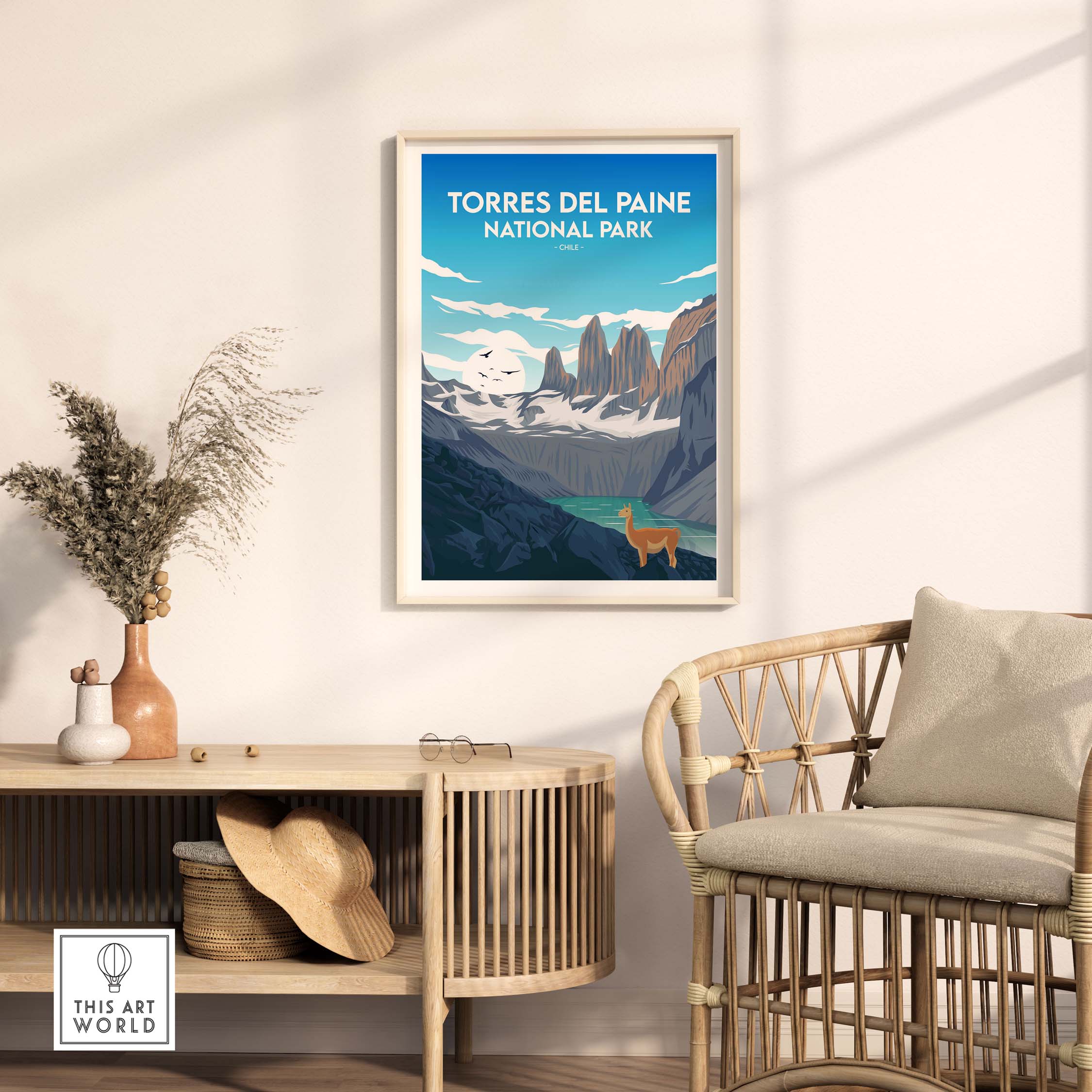 Torres del Paine National Park print displayed in a stylish living room, featuring vintage travel poster art.