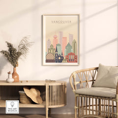 Framed Vancouver city print wall art showcasing iconic architecture in warm pastel tones.