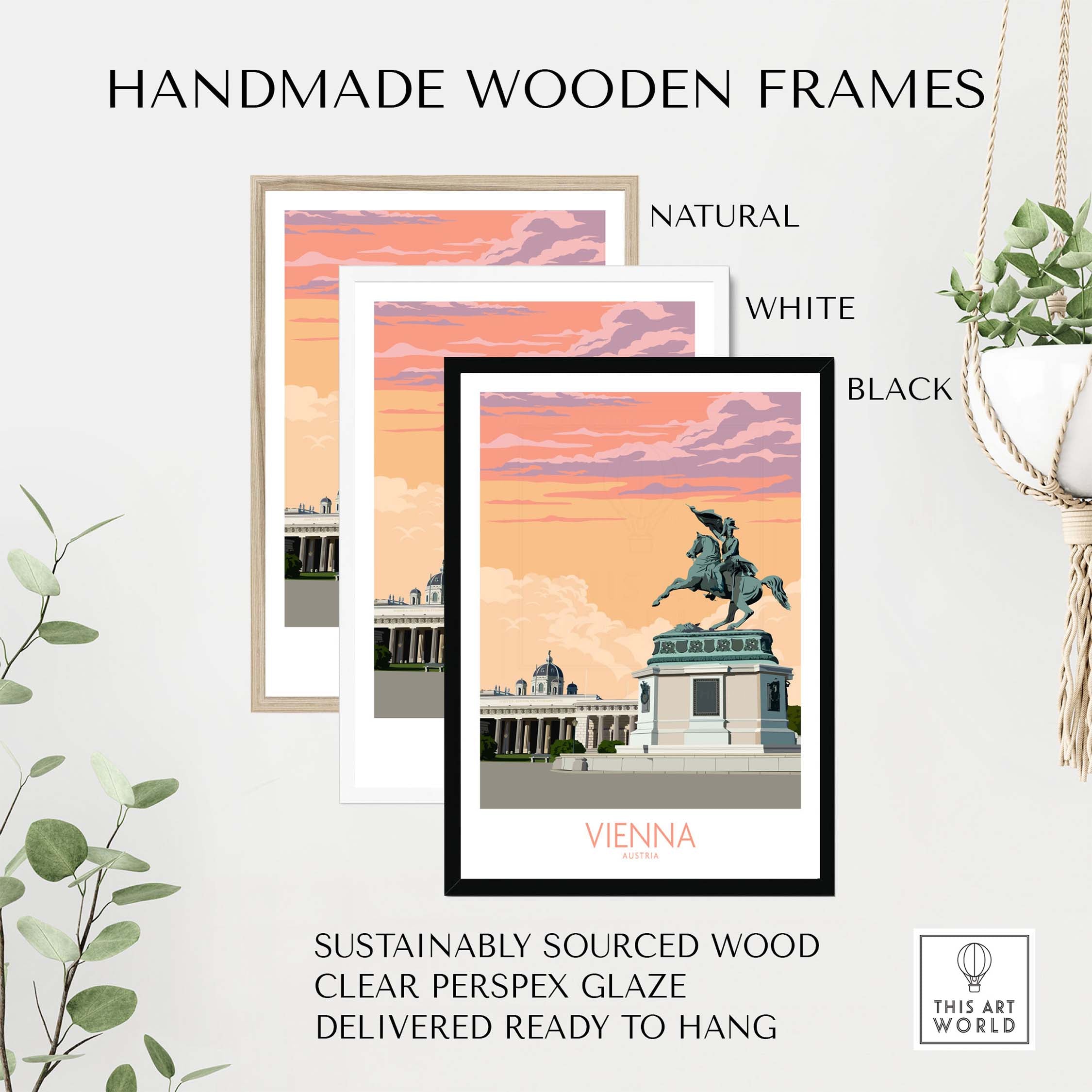 Three handmade wooden frames in natural, white, and black displaying a Vienna travel poster.